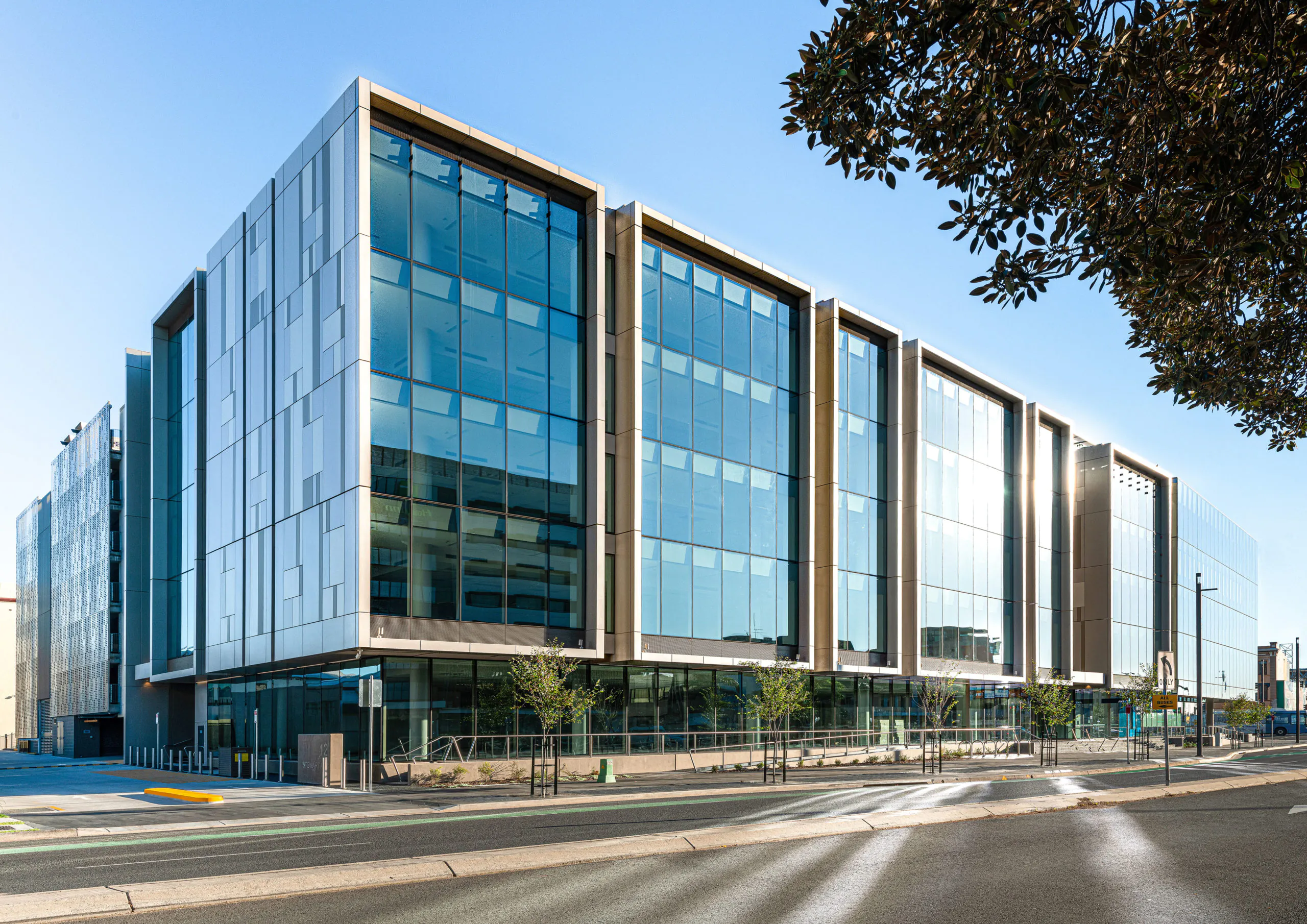 High-rise commercial tower with modern glass facade.